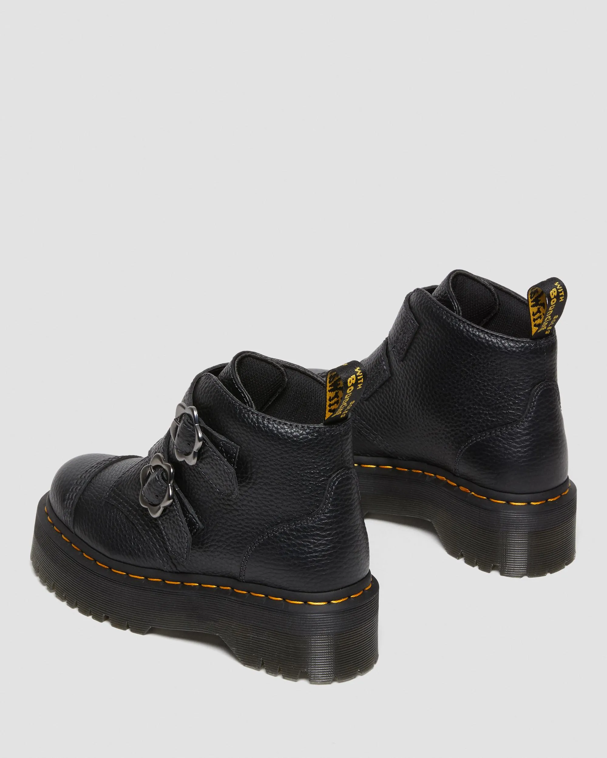 Devon Dr. Leather platform boots with floral buckle. Martens